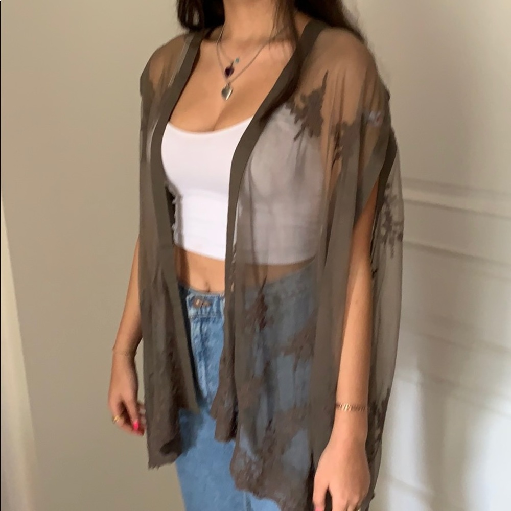 Green mesh vest with lace detailing